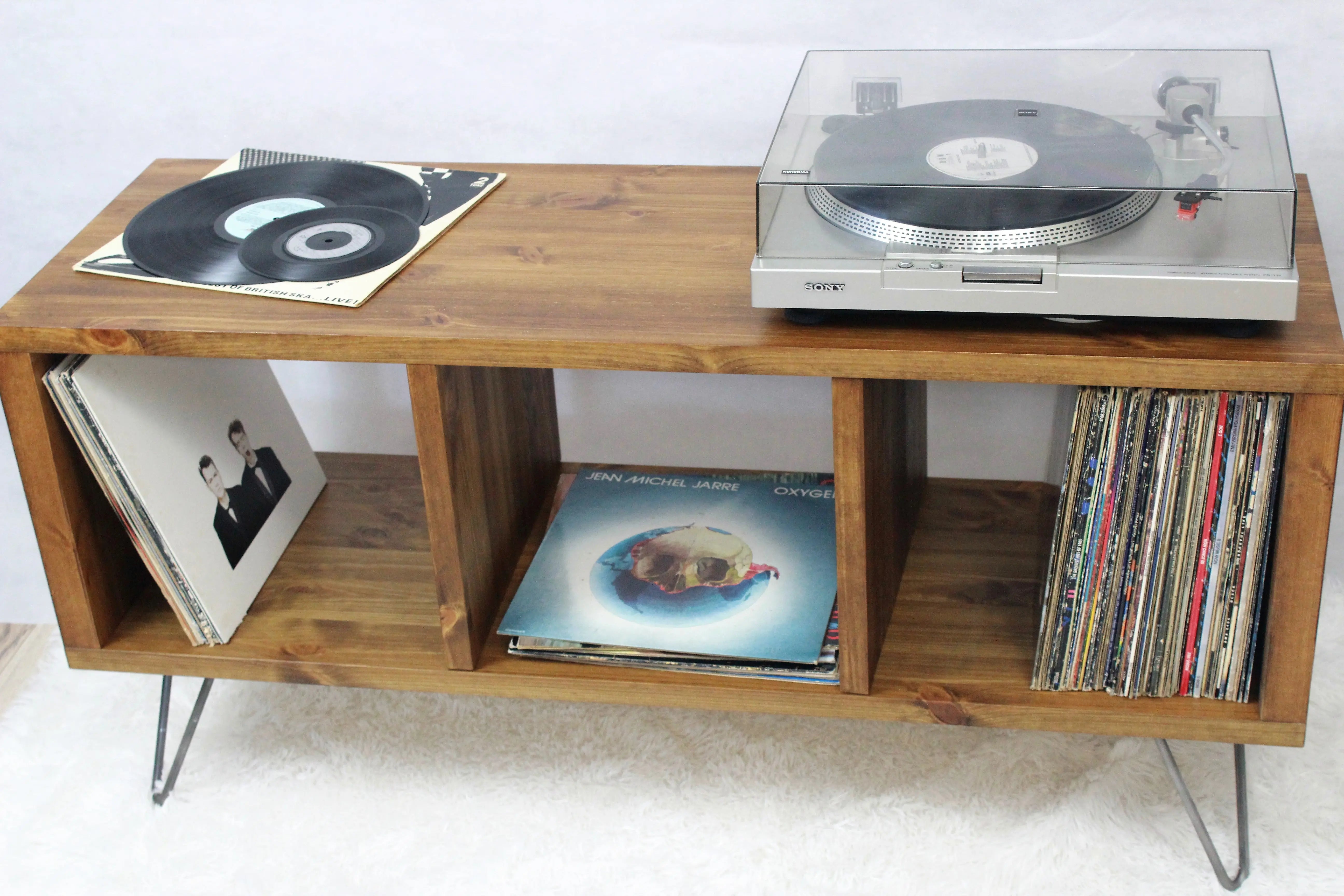 Tv stand with outlet record player storage